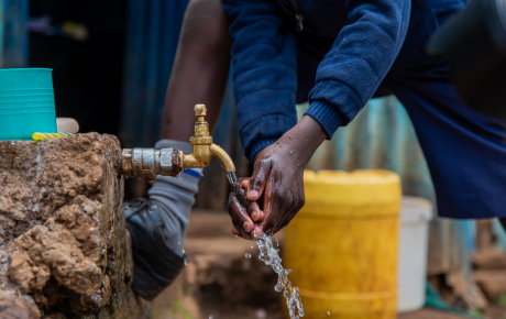 A pupil washing hands at Sifa Education Center in Kawangware, Nairobi, Kenya. Victor Wahome. Oxfam (3).jpg
